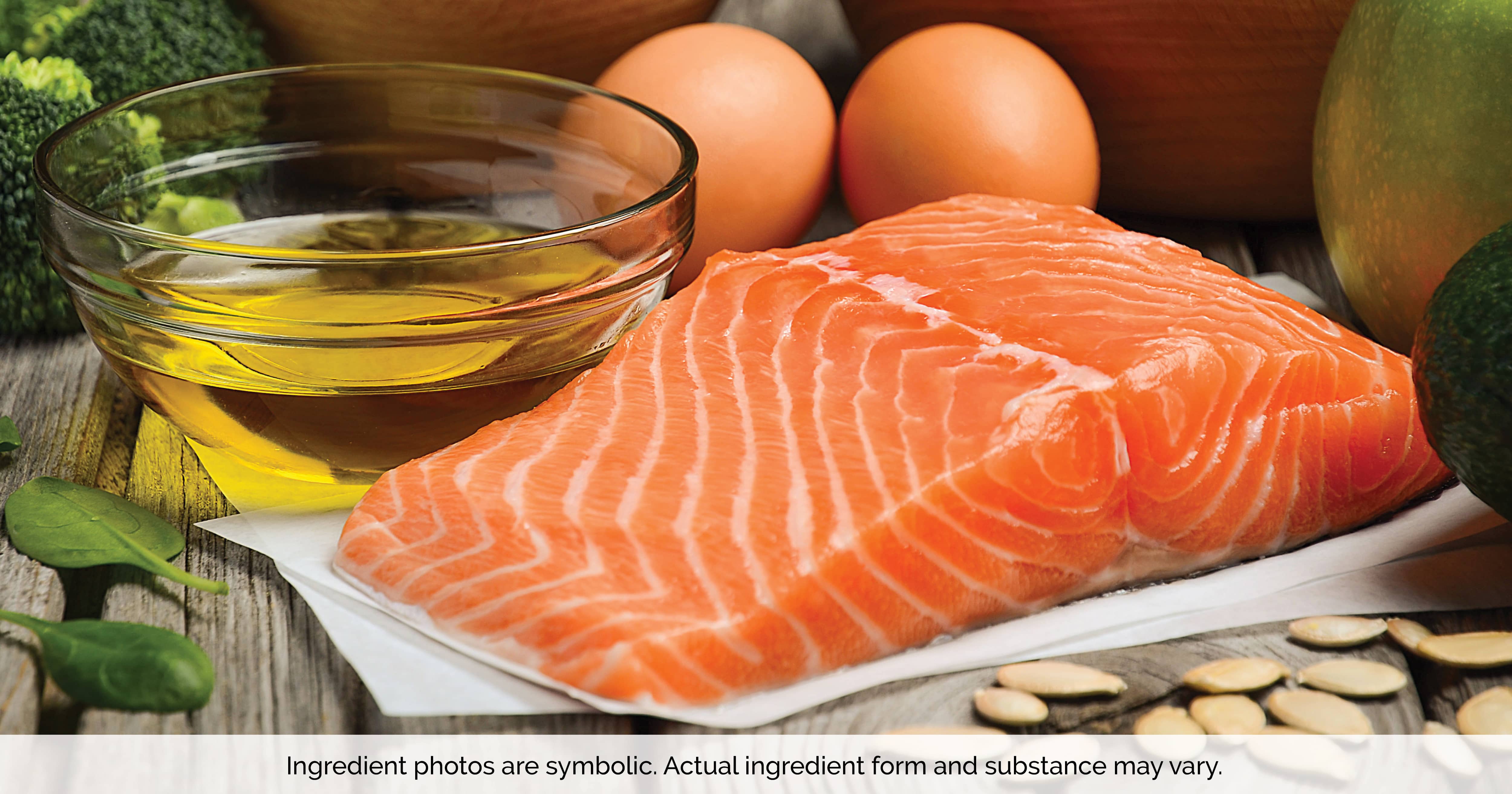 A fresh cut of salmon lying on a table next to a cup of oil and two eggs.