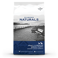 The front of a bag of Diamond Naturals Small & Medium Breed Puppy Chicken & Rice Formula.